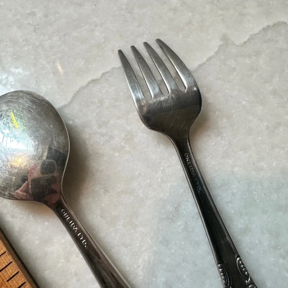 Small silverplate utensils.